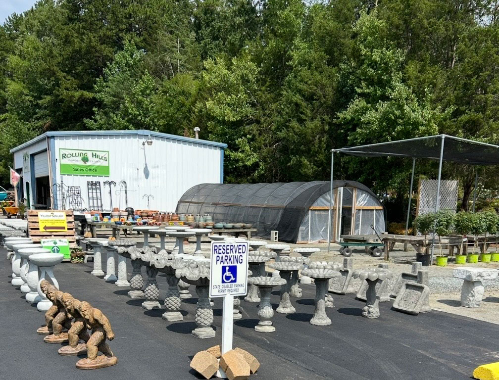 Rolling Hills Garden Center sales office, greenhouse, and concrete statuary display